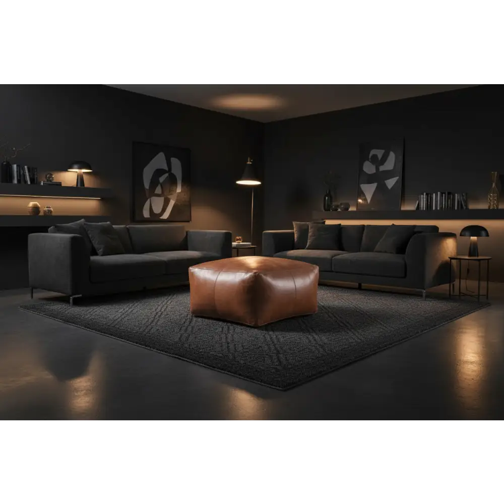 Tan leather ottoman in dark modern interior